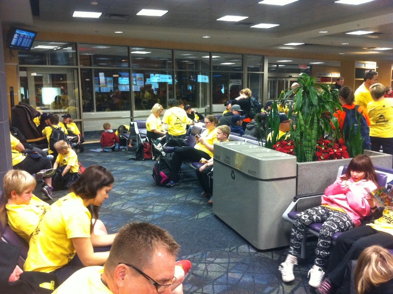 The calm before the flight: Okanagan participants in the 2013 Sunshine Foundation Dreamlift trip to Disneyland wait to board the plane Tuesday morning. Wendy's restaurants in the BC Southern Interior raise money to make the event happen. 