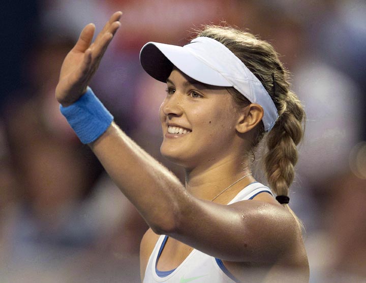 Eugenie Bouchard waves to the crowd after defeating Alisa Kleybanova of Russia in their Rogers Cup women's tennis match in Toronto on Tuesday, Aug. 6, 2013. 