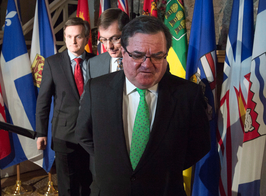 Federal Finance Minister Jim Flaherty updates media after a meeting in Meech Lake to discuss pension reform with provincial ministers.