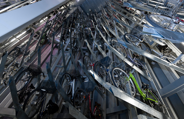 Bicycles are stacked on top of each other inside the ECO Cycle system at the Konan Hoshi No Koen Parking on December 3, 2013 in Tokyo, Japan.