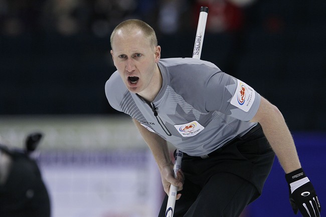 Skip Brad Jacobs calls to his sweepers in draw 6 at the 2013 Roar Of The Rings championship in Winnipeg on Tuesday.