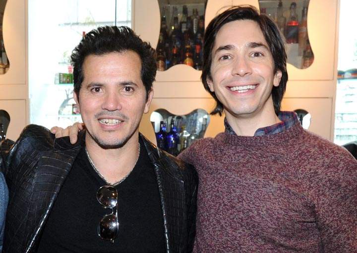 John Leguizamo and Justin Long attend the "Walking With Dinosaurs" screening after party at Dylan's Candy Bar on December 15, 2013 in New York City.  