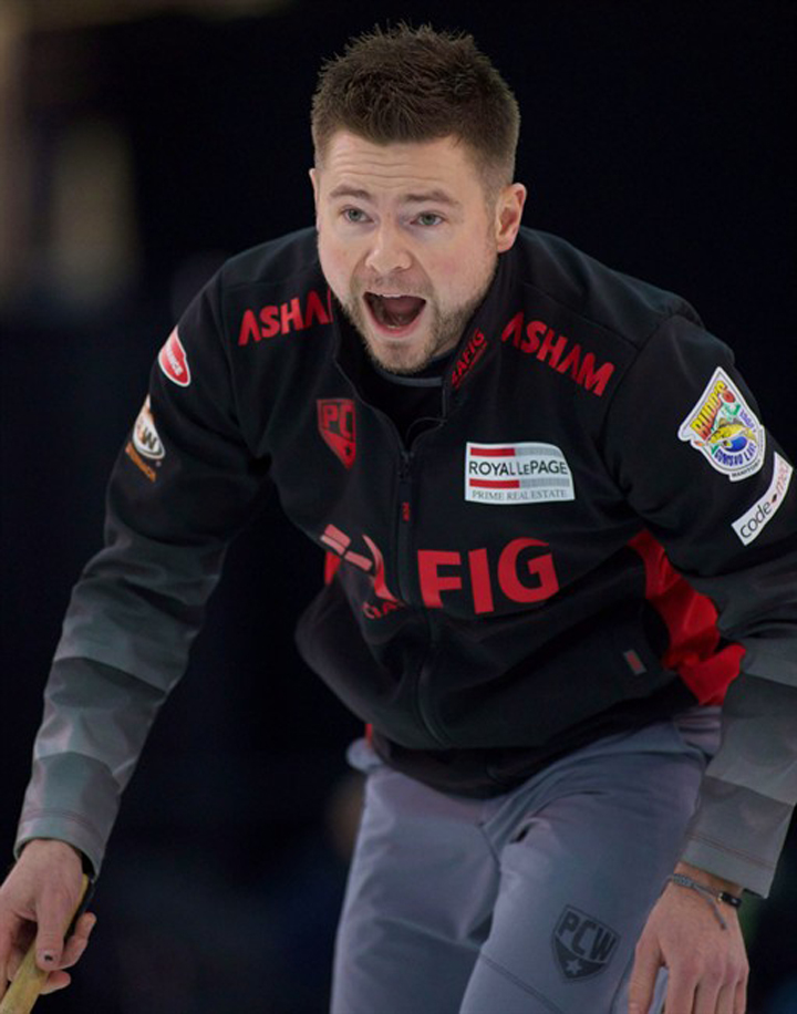 Mike McEwen shown here curling in 2013 beat John Shuster 7-4 in early action at Grand Slam of Curling National.