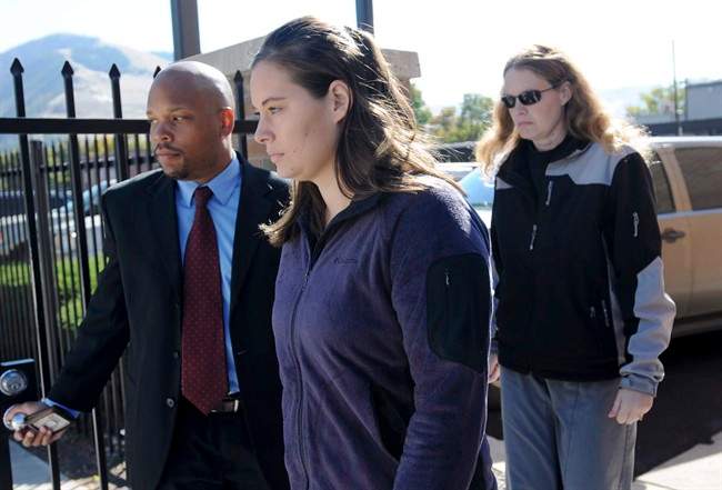  In this Oct. 4, 2013 file photo, Jordan Linn Graham, center, leaves federal court, in Missoula, Mont. Jury selection is scheduled to begin Monday Dec. 9, 2013, in Graham's trial on a charge of murder in the death of Cody Johnson, just eight days after the two got married. (AP Photo/The Missoulian, Michael Gallacher, File).