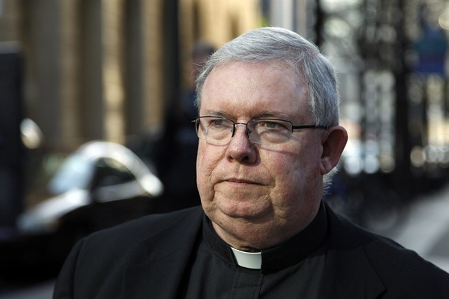 FILE - In this March 27, 2012 file photo, Monsignor William Lynn leaves the Criminal Justice Center in Philadelphia.
