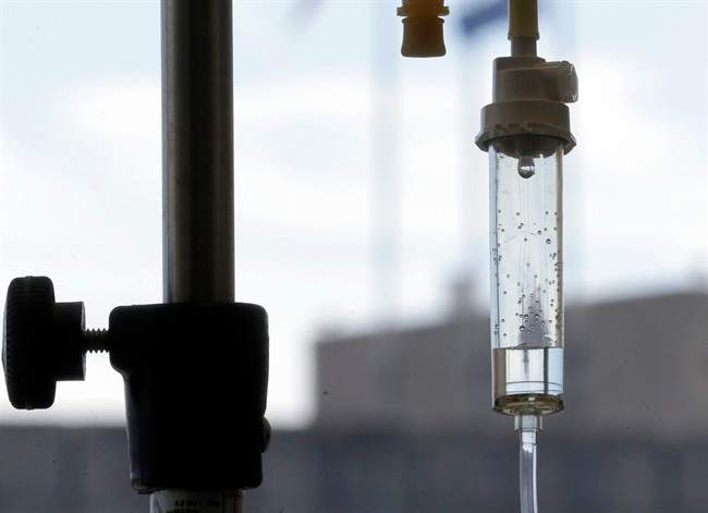 In this Thursday, Sept. 5, 2013 photo, chemotherapy is administered to a cancer patient via intravenous drip at Duke Cancer Center in Durham, N.C.