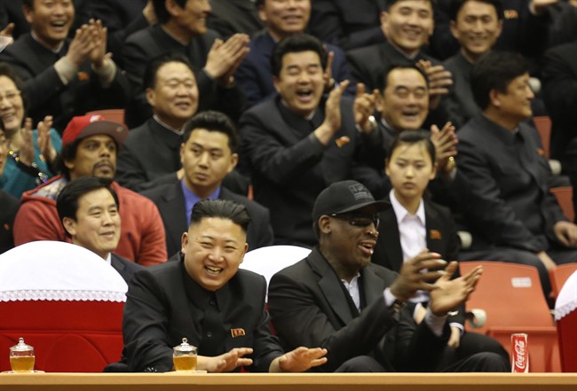 FILE - North Korean leader Kim Jong Un, left, and former NBA star Dennis Rodman watch North Korean and U.S. players in an exhibition basketball game at an arena in Pyongyang, North Korea, Thursday, Feb. 28, 2013.