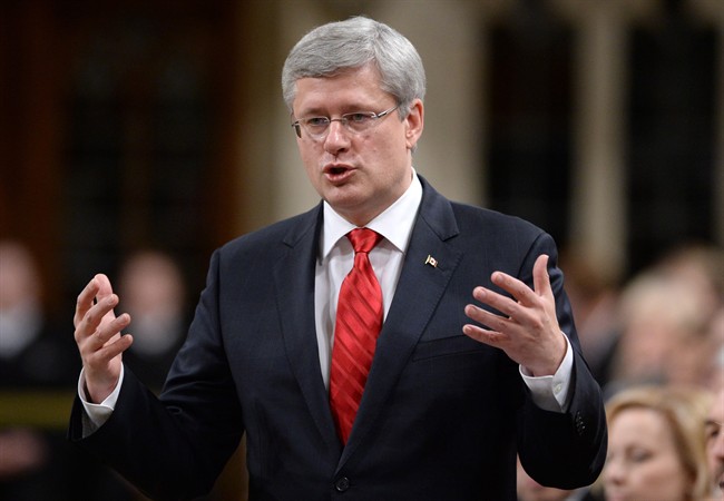 Prime Minister Stephen Harper responds to a question during Question Period in the House of Commons on Parliament Hill in Ottawa on Wednesday, December 4, 2013. THE CANADIAN PRESS/Sean Kilpatrick.