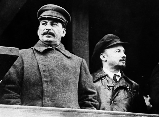 FILE - In this Nov. 21, 1930, file photo, from left to right, former Russian leader Josef Stalin and Soviet politician Nikolai Bukharin are seen together, in Moscow.