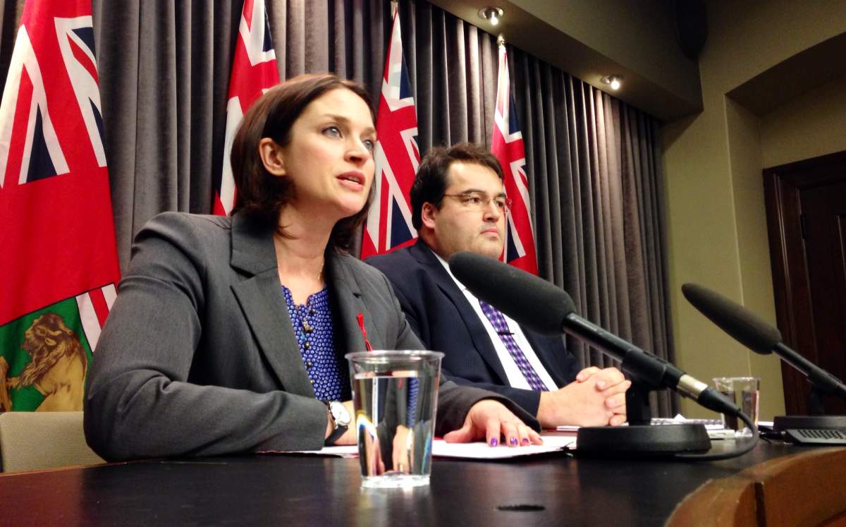 Manitoba Health Minister Erin Selby and Manitoba health emergency services director Gerry Delorme talks about the suspension of STARS air ambulance service at a news conference in Winnipeg on Monday.