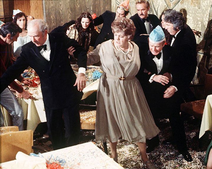 Shelley Winters (middle) and the passengers of the S.S. Poseidon have a rocky New Year's Eve in this scene from 'The Poseidon Adventure.'.