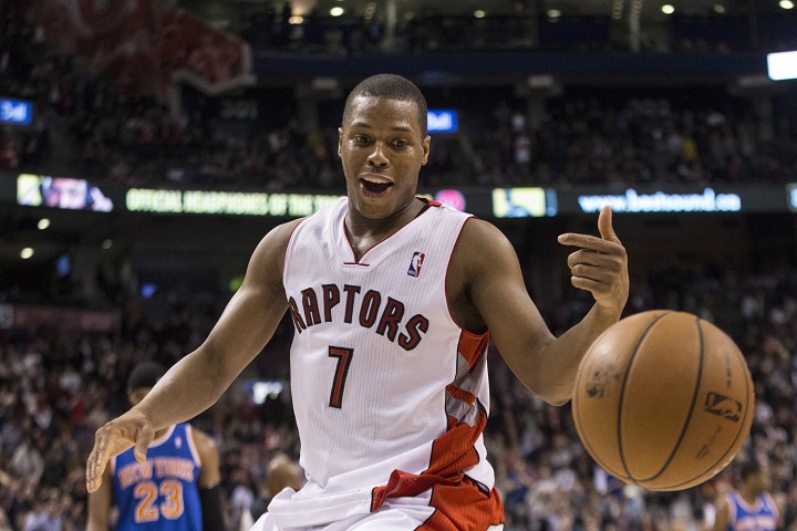 Toronto Raptors' Kyle Lowry gathers up the ball at the end of his team's 115-100 win over New York Knicks in NBA basketball action in Toronto on Saturday December 28, 2013.