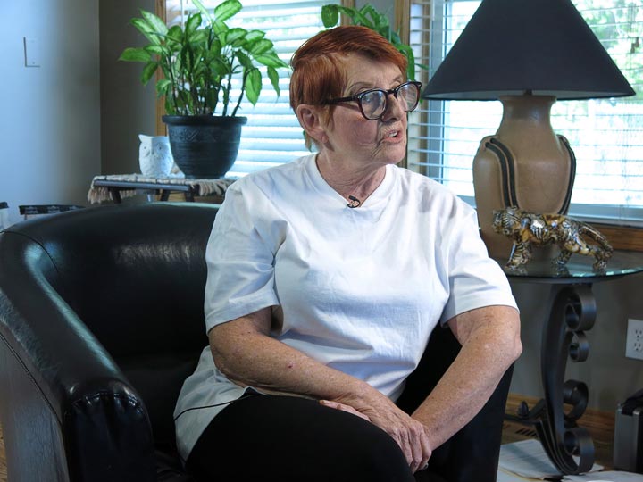 Rebekah Caverhill discusses the arrest of self-proclaimed sovereign citizen Andreas Pirelli in her home in Sylvan Lake, Alta. on Friday , September 27, 2013. (Bill Graveland/The Canadian Press)