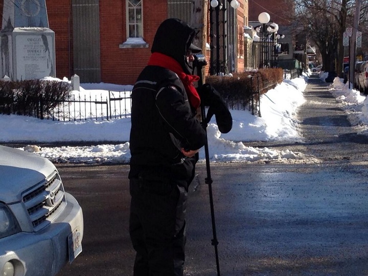 Investigators conduct surveillance at funeral of reputed mafia boss Vito Rizzuto on December 30, 2013.