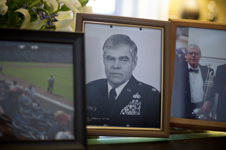 A photo of Ret. Lt. Col. Ronald Westbrook sits on the coffee table in his home, Thursday, Dec. 5, 2013, in Chickamauga, Ga.