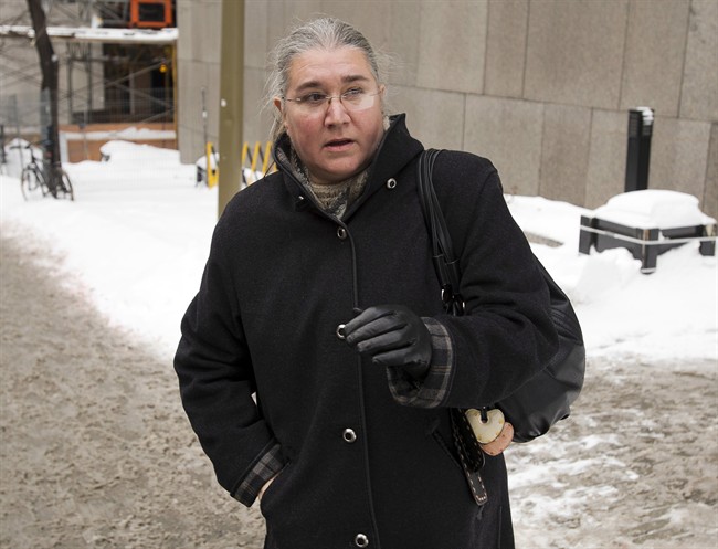 Pamela Mattock Porter leaves court after her request to have her bail conditions changed so she can spend the winter in Florida were denied, Thursday, December 19, 2013 in Montreal.