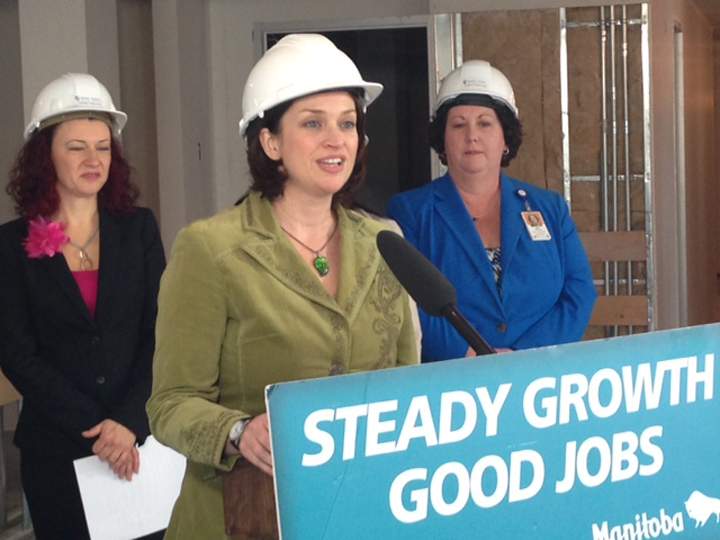 Health Minister Erin Selby talks after a tour of the new health centre opening in west Winnipeg in spring.