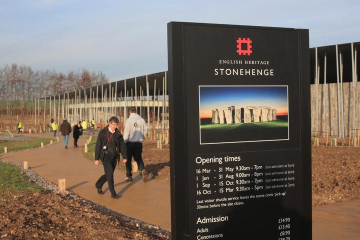 People walk towards the new Stonehenge visitor centre and exhibition on December 11, 2013 in Wiltshire, England.  