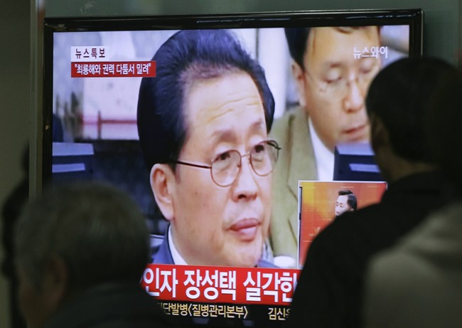 In this Dec. 3, 2013 file photo, people watch a TV news program showing North Korean leader Kim Jong Un's uncle, Jang Song Thaek, at the Seoul Railway Station in Seoul, South Korea. North Korea on Monday, Dec. 9, 2013, acknowledged the purge of leader Kim Jong Un's influential uncle for alleged corruption, drug use, gambling and a long list of other "anti-state" acts, apparently ending the career of the country's second most powerful official. (AP Photo/Ahn Young-joon, File).