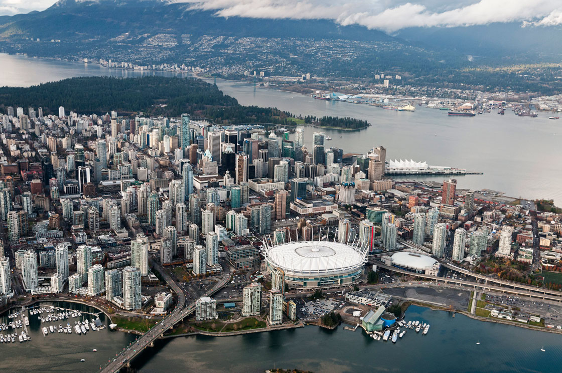 An aerial view of Vancouver's downtown core including BC Place stadium and the high-rise condo towers of the Yaletown district. The Canadian Press Images/Bayne Stanley