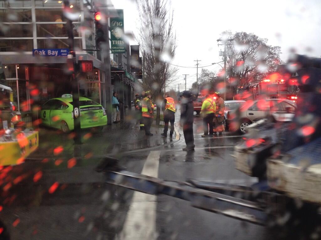 A taxi driver crashed into a storefront on Oak Bay Avenue Friday morning after running a red light. 