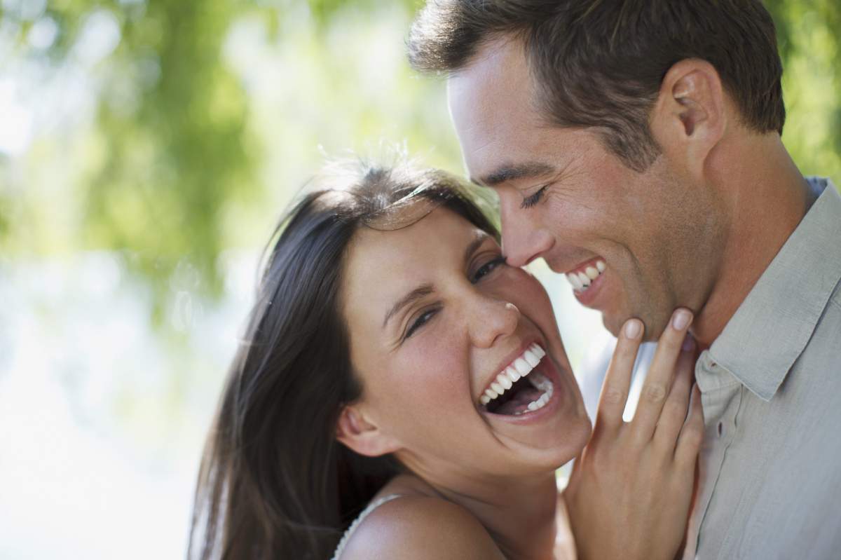 Happy couple laughing together