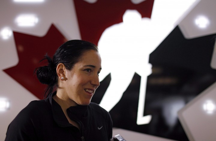 Canadian National Women's hockey player Caroline Ouellette, from Montreal, Que., speaks to a reporter a news conference in Calgary, Alta., Monday, May 27, 2013. The team is heading to Penticton, B.C., for a month-long boot camp.THE CANADIAN PRESS/Jeff McIntosh.