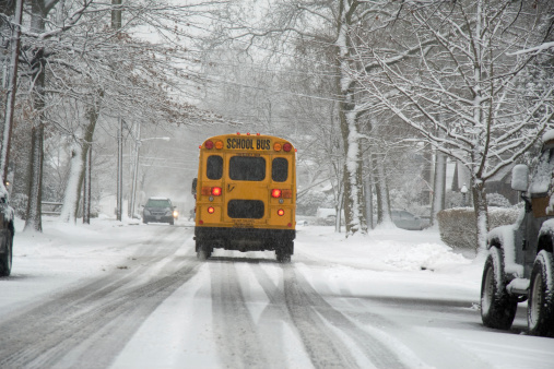 A school bus in the snow.