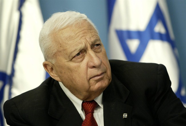 FILE - In this Sunday May 16, 2004 file photo, Israeli Prime Minister Ariel Sharon pauses during a news conference in his Jerusalem office regarding education reform. 
