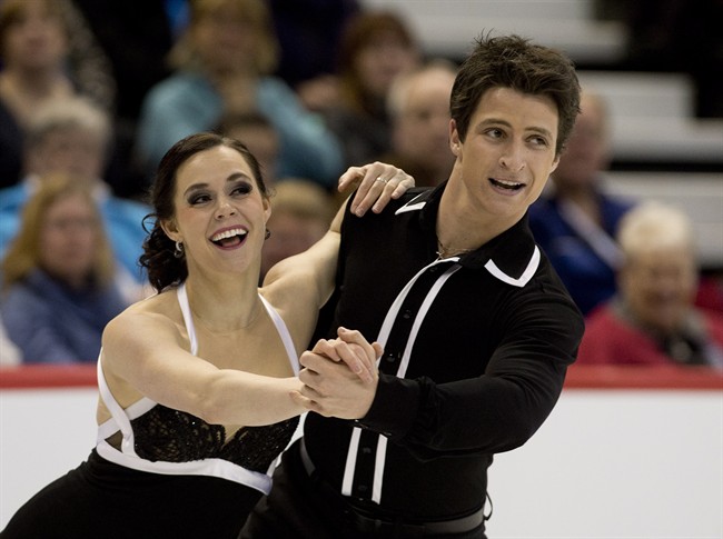 Tessa Virtue and Scott Moir perform their short program during Senior Dance competition at the Canadian Skating Championships Friday January 10, 2014 in Ottawa. THE CANADIAN PRESS/Adrian Wyld.