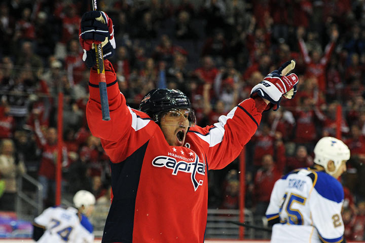Alex Ovechkin #8 of the Washington Capitals celebrates after scoring his second goal of the first period against the St. Louis Blues during an NHL game at the Verizon Center on November 17, 2013 in Washington, DC.