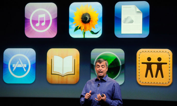 Apple CEO Tim Cook introduces the Apple 4S with cloud technology in this 2011 photo. 