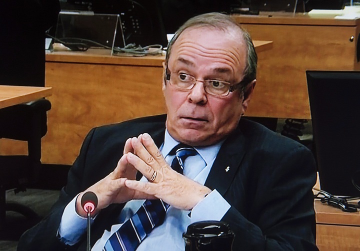 Former FTQ president Michel Arsenault is seen on a photograph taken off a television monitor at the Charbonneau inquiry looking into corruption in the Quebec construction industry Wednesday, January 29, 2014 in Montreal.
