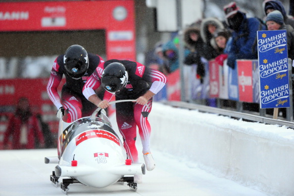 Justin Kripps and Bryan Barnett of Canada start their 2 Man Bobsled run during the Viessmann IBSF Bobsled and Skeleton World Cup event at Utah Olympic Park December 6, 2013 in Park City, Utah.