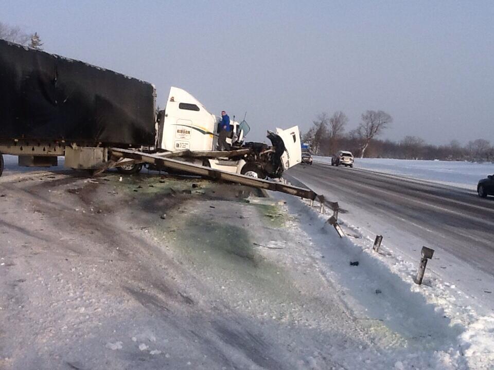 A tractor trailer jackknifed on Highway 400 near Innisfil on Jan. 6, 2014.