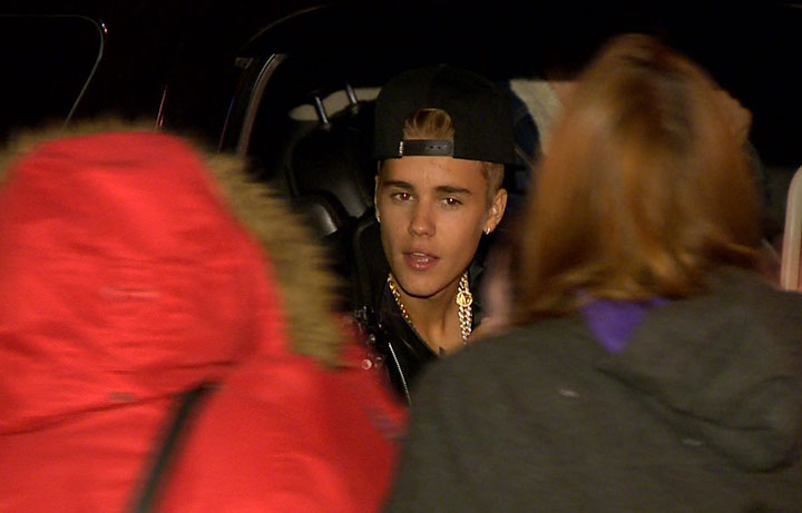 Justin Bieber greets fans outside the Hazelton Hotel in Toronto on Jan. 29, 2014.