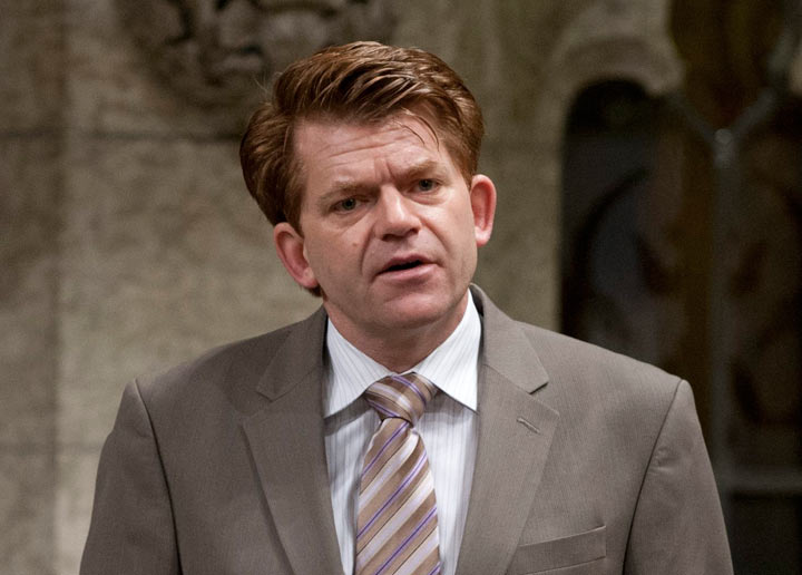 Conservative MP Brian Jean rises during question period in the House of Commons Friday December 9, 2011 in Ottawa. THE CANADIAN PRESS IMAGES/Adrian Wyld.