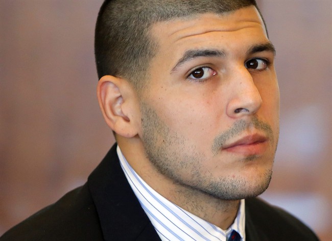 In this Oct. 9, 2013, file photo, former New England Patriots NFL football player Aaron Hernandez attends a pretrial court hearing in Fall River, Mass. 
