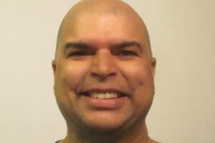 Narinder Wasan is East Indian, 5'7" tall, 180 pounds with a bald head and brown eyes. 