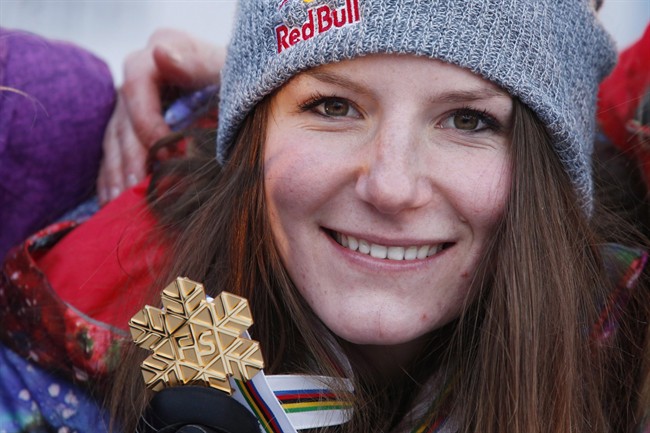 Kaya Turski from Canada shows off her gold medal after the women's slopestyle final Saturday March 9, 2013, during the ongoing Freestyle World Ski Championships at Voss, Western Norway. 