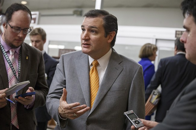 Texas Sen. Ted Cruz speaks with reporters on Capitol Hill in Washington, on Dec. 17, 2013. 