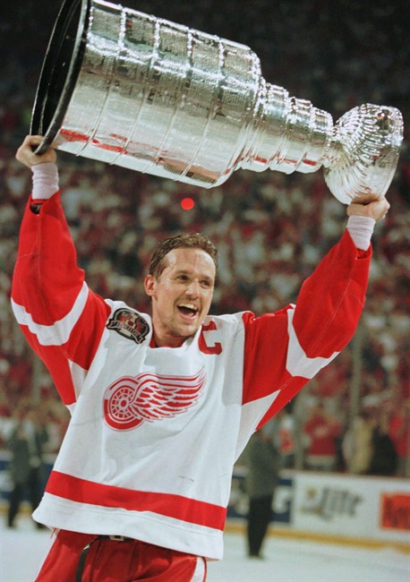 Detroit Red Wings captain Steve Yzerman skates off with the Stanley Cup in Detroit, June 7, 1997, after the Red Wings swept the Philadelphia Flyers in four games. 