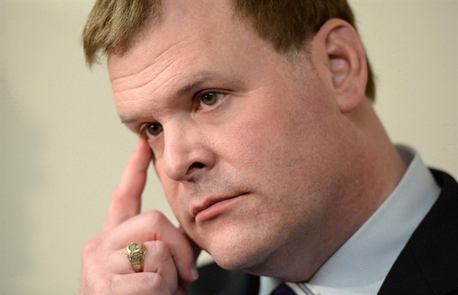 Minister of Foreign Affairs John Baird attends an event in Ottawa on Thursday, December 12, 2013. 