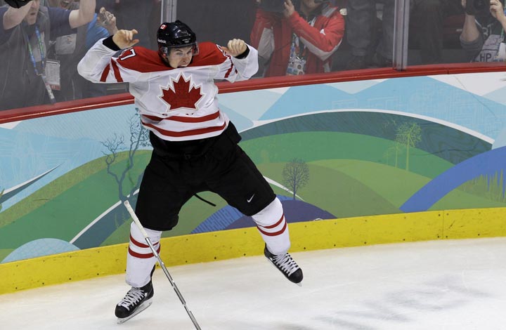 Canada's Sidney Crosby  leaps in the air  after making the game-winning goal in the overtime period of a men's gold medal ice hockey game against USA at the Vancouver 2010 Olympics in Vancouver, British Columbia.