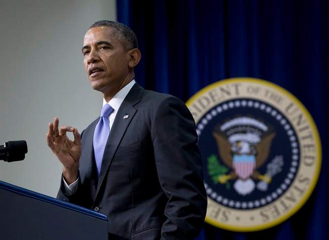 President Barack Obama speaks in the South Court Auditorium in the Eisenhower Executive Office Building on the White House complex, Thursday, Jan. 16, 2014, in Washington.