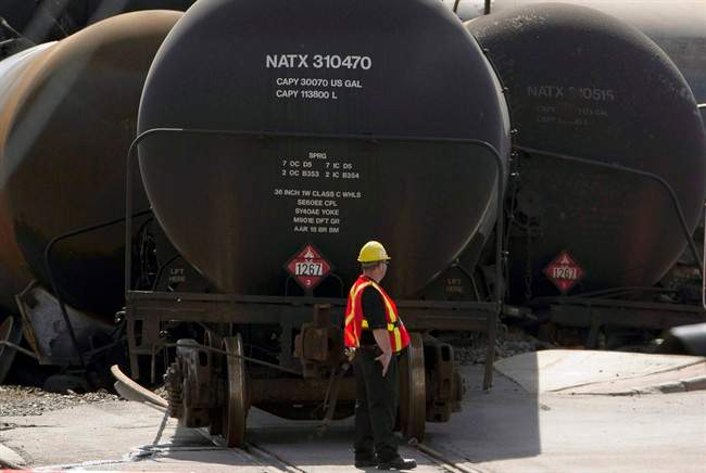 In this July 12, 2013, photo, damaged tanker cars are seen in Lac-Megantic.