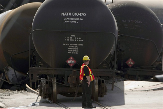 In this July 12, 2013, photo, damaged tanker cars are seen in Lac-Megantic.