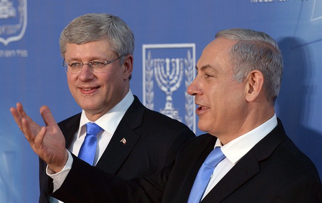 Prime Minister Stephen Harper and Israeli Prime Minister Benjamin Netanyahu talk following a joint press conference in Jerusalem, Israel on Tuesday, January 21, 2014. 