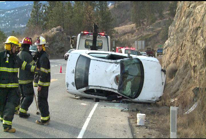 Peachland accident sends car onto its roof - image