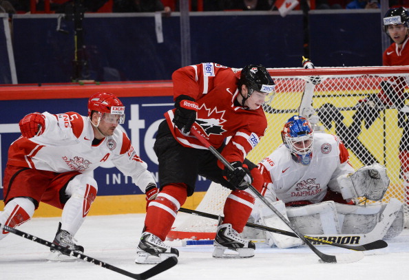 Canada's Matt Duchene goes for a goal on Denmark's goalkeeper Simon Nielsen during the preliminary round match Canada vs Denmark at the 2013 IIHF Ice Hockey World Championships on May 4, 2013 in Stockholm.